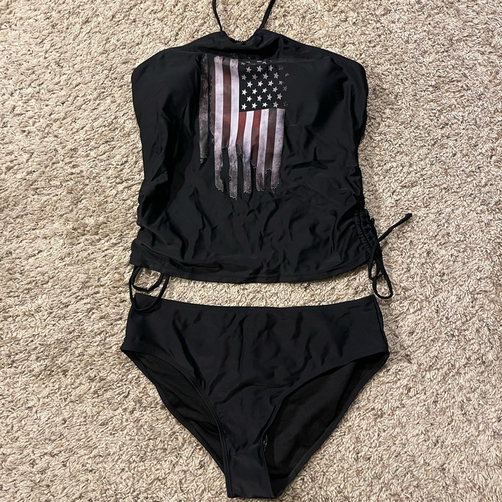 USA halter style tankini. Size L. Never worn.